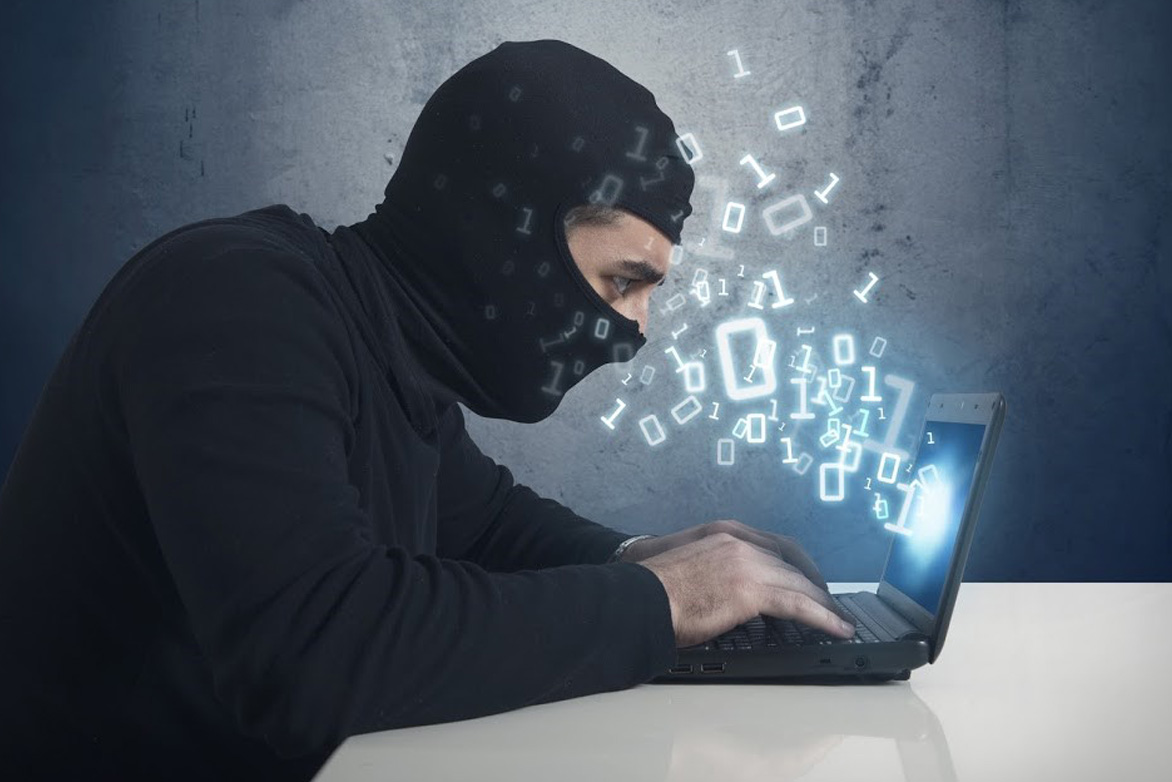 Image of a man wearing a ski mask representing a scammer.