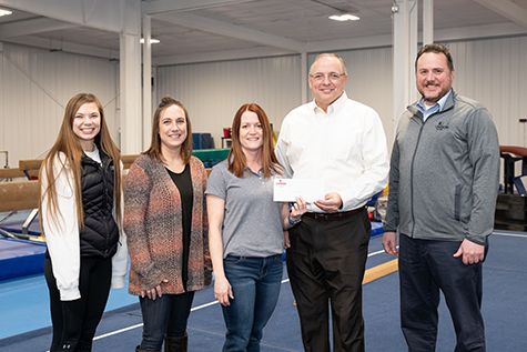 Unison Bank donated $25,000 to the Jamestown Gymnastics Club capital campaign for their facility expansion project. Pictured from left to right is JGC Assistant Director Bre Carlson, JGC Board President Danielle Hatch, JGC Executive Director Andrea Bitz, Unison Bank President & CEO Kelly Rachel and Unison Bank AVP Information Systems/Information Security Andrew Workman.