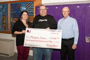 Unison Bank has partnered with Montpelier Public School to help fund the purchase of a new sound system to replace its current audio set up. Pictured from left to right: Montpelier Public School Secretary, Melissa Marshall and Superintendent Phil Leitner, and Unison Bank Chief Credit Officer ND Mark Domek.