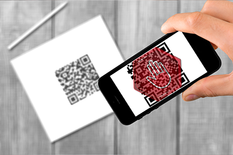 Phone scanning QR code with warning sign